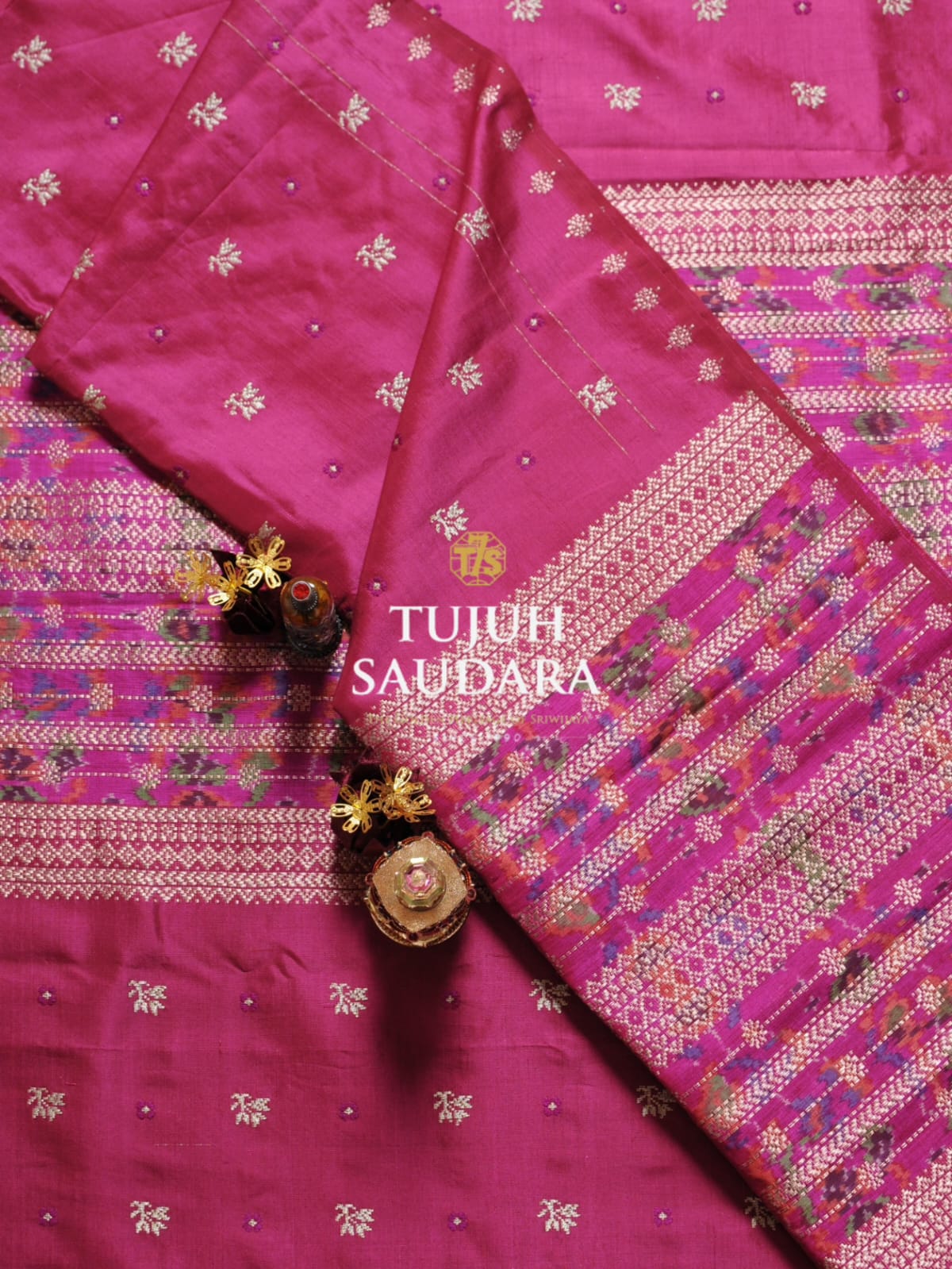 Songket bertabur motif cengkeh