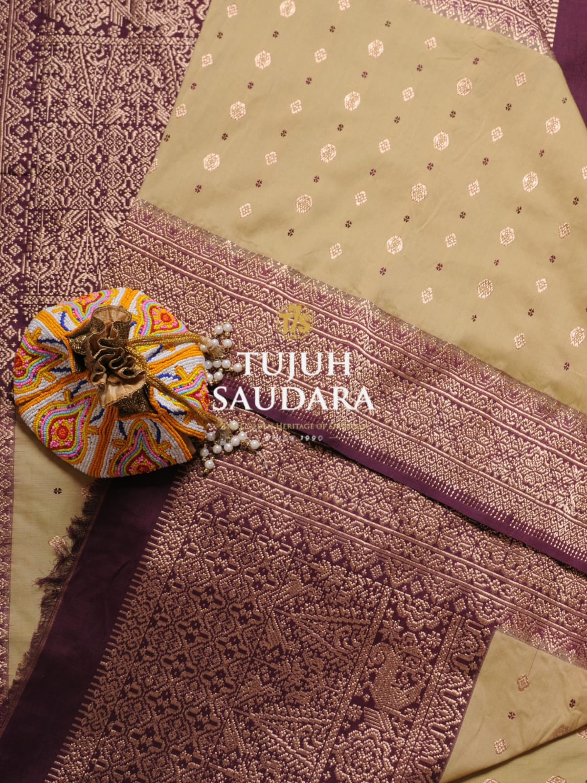 Songket bertabur motif cermin